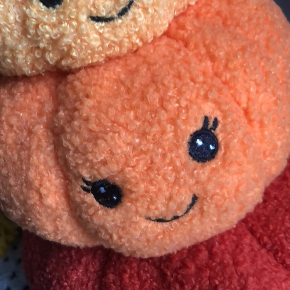 Stacked SHERPA Pumpkins with Smiley Faces
